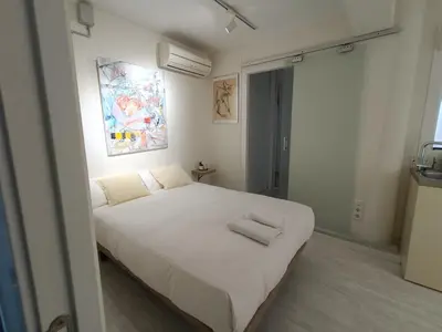 Cama o camas de una habitación en ATELIER EU-ARTISTA