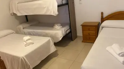 Cama o camas de una habitación en Hospedium DLJ Hostal Ben Nassar