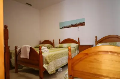 Cama o camas de una habitación en Hospedium DLJ Hostal Ben Nassar