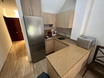 Una cocina o zona de cocina en Apartamento Duplex El Porche