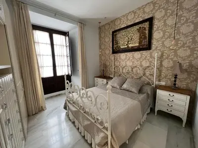 Cama o camas de una habitación en Apartment Palacio de Los Vibora Parking Gratis