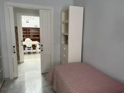 Cama o camas de una habitación en Apartment Palacio de Los Vibora Parking Gratis