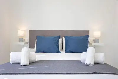 Cama o camas de una habitación en Muro city center suite by Valcambre