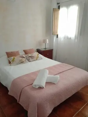 Cama o camas de una habitación en Claustro Home Casco Histórico Córdoba