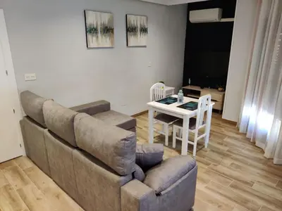 Zona de estar de Duerme a gusto - Tu habitación acogedora en Torredonjimeno
