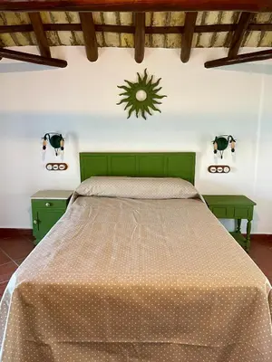 Cama o camas de una habitación en Cortijo Doñana