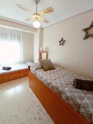 Cama o camas de una habitación en Apartamento La Viñuela
