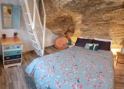 Cama o camas de una habitación en Casa Cueva La Luna