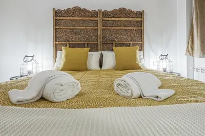 Cama o camas de una habitación en Alohamundi Castellar