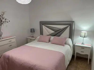 Cama o camas de una habitación en La encantá