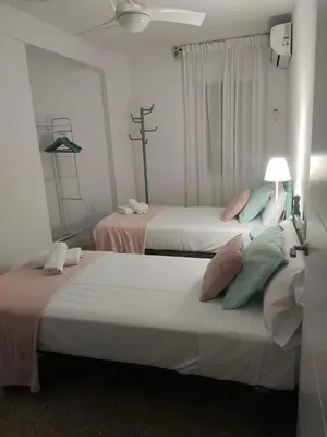 Cama o camas de una habitación en GRUPO LIMCOTEL EL PASEITO DE CONCHA-MEsQUITA-PARKING