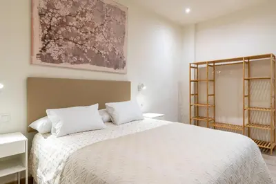 Cama o camas de una habitación en Apartamentos Cervantes 17