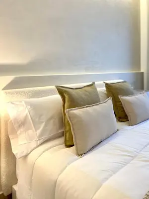 Cama o camas de una habitación en Arcos de Medina - Apartamentos premium