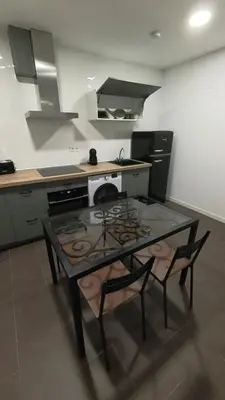 Una cocina o zona de cocina en Alojamiento Los naranjos con Piscina y Parking gratuito