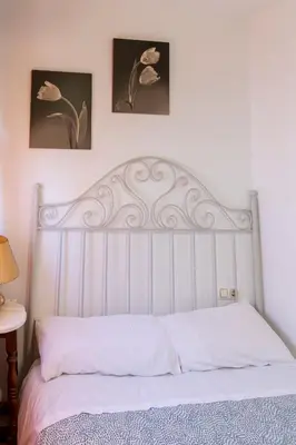Cama o camas de una habitación en Atico Junto a la Mezquita