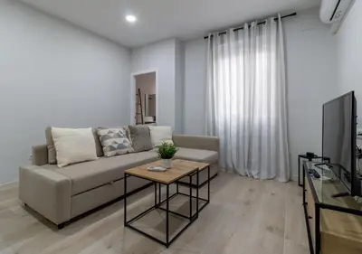 Una televisión o centro de entretenimiento en Apartamento Huerto San Pedro