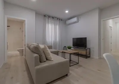 Una televisión o centro de entretenimiento en Apartamento Huerto San Pedro
