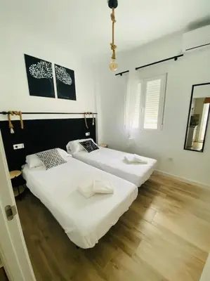 Cama o camas de una habitación en SunShine San Eloy - Centro de Cordoba