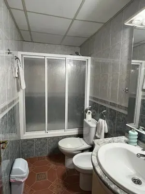 Un baño de APARTAMENTO LA MURALLA